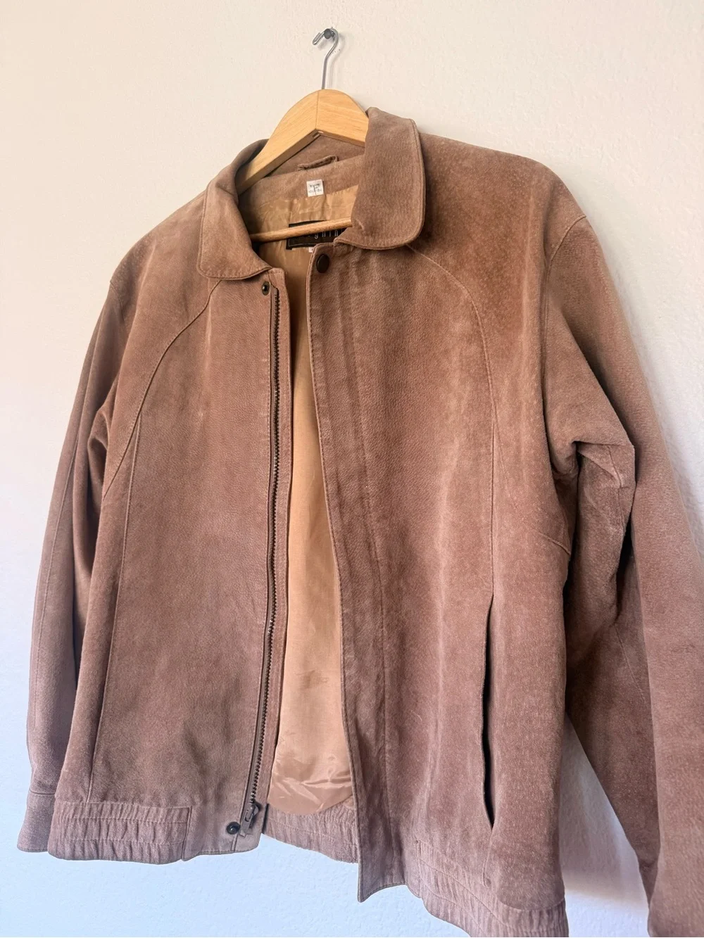 Tan leather bomber jacket